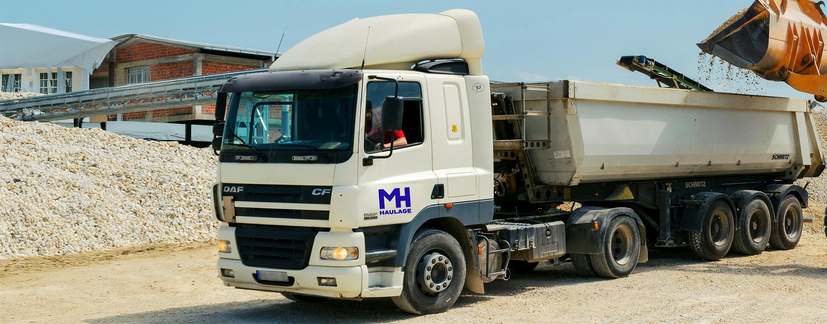 MH Haulage logo on the side of a truck